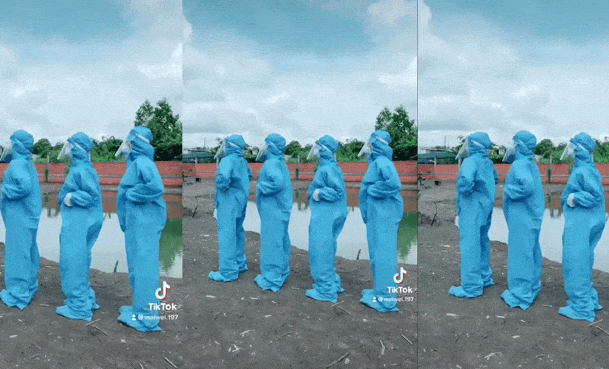 Doi lay mau Covid-19 o TP.HCM nhay 'chicken dance' truoc khi lam viec hinh anh