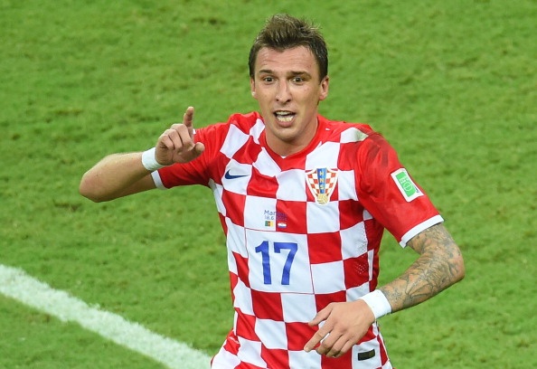 Mandzukic lap cu dup tien 'su tu chau Phi' ve nuoc som hinh anh