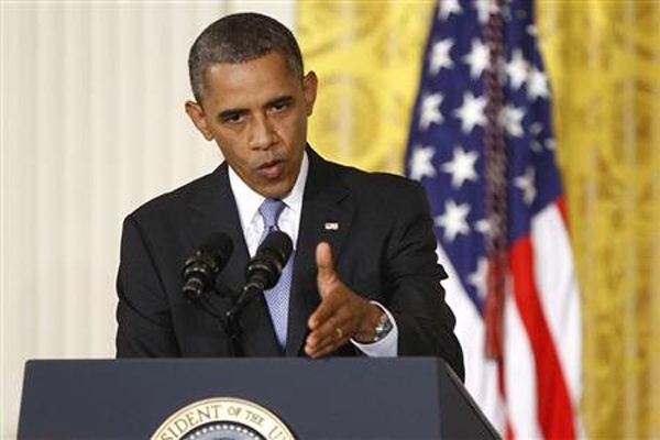 Obama: 'Doi khi Putin giong nhu dua tre buon chan' hinh anh