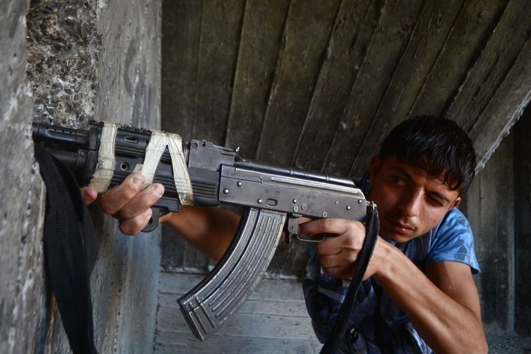 Chau Au cao buoc chinh phu Syria dung vu khi hoa hoc hinh anh