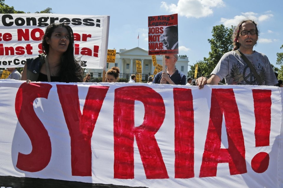 Obama 'chay so' phong van vi muon tan cong Syria hinh anh