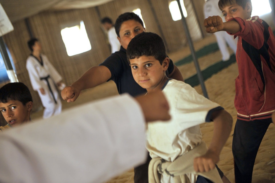 Tre em Syria tap Taekwondo trong cac trai ti nan hinh anh