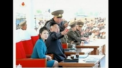 Kim Jong Un xem cuoc thi cua phi co tai can cu khong quan hinh anh