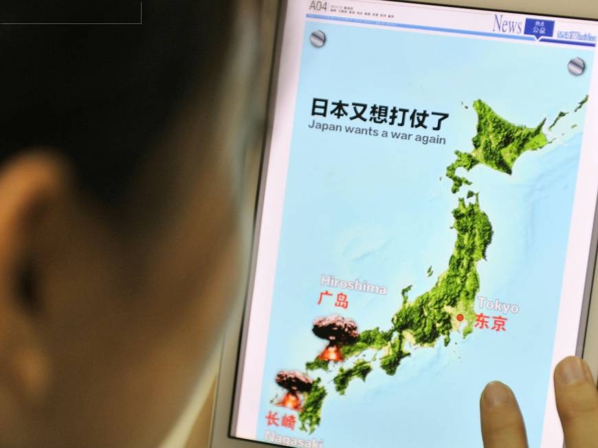 Nhat Ban noi gian khi bao TQ dang hinh minh hoa 'bat can' hinh anh