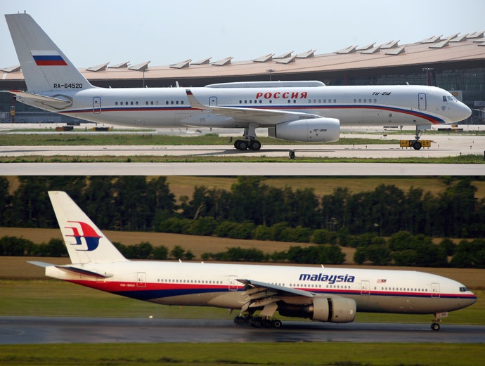 Chuyên cơ của Tổng thống Vladimir Putin và một máy bay Boeing 777 của MAS. Ảnh: AFP
