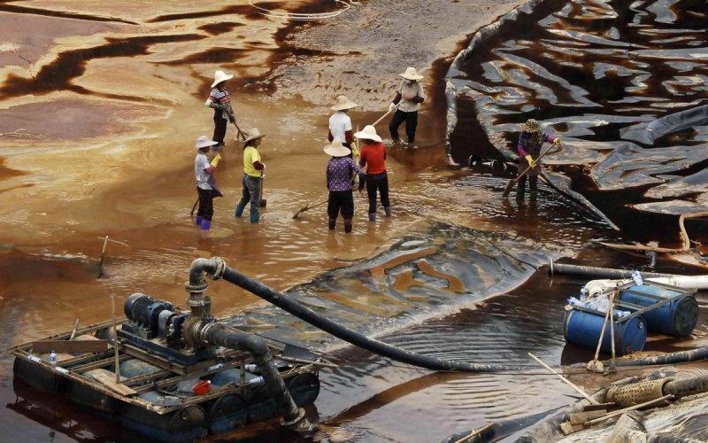 Trung Quoc thua kien My trong tranh chap dat hiem hinh anh