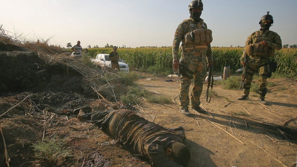 Phien quan Hoi giao cong khai hanh quyet 6 binh si Iraq hinh anh