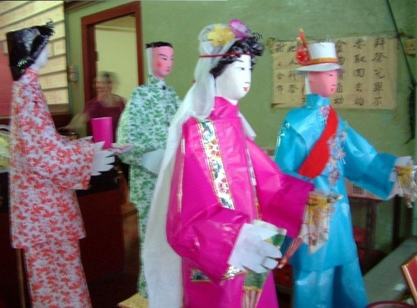 Trung Quoc bat 11 nguoi dao xac ban cho 'dam cuoi ma' hinh anh