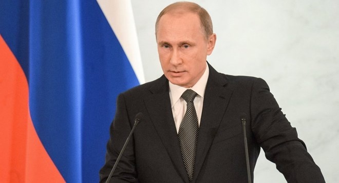Putin: Nga se khong cui dau truoc suc ep phuong Tay hinh anh