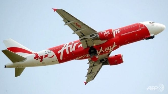 Cam tam thoi chuyen bay hang tuan cua AirAsia den Singapore hinh anh