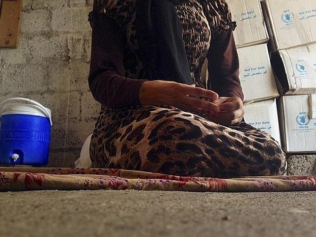 Gap 'nguoi hung' giai cuu no le tinh duc IS hinh anh