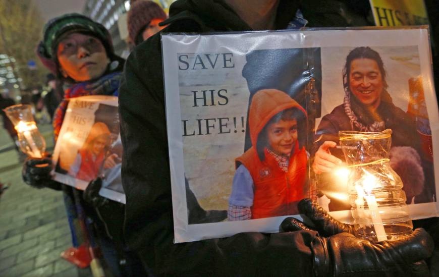 Lanh dao My, Anh len an vu hanh quyet con tin Nhat thu hai hinh anh