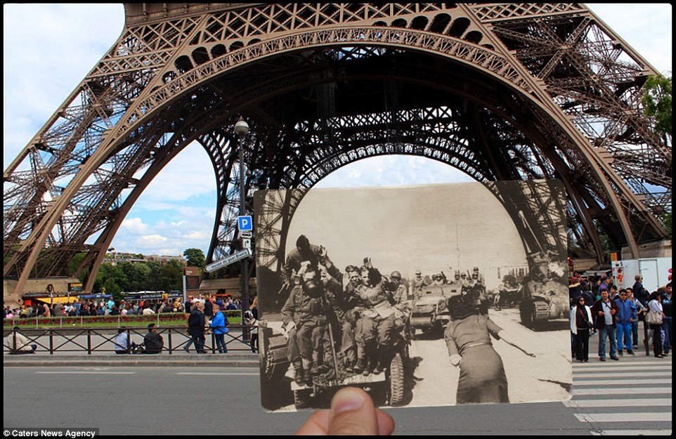 Binh sĩ Đức di chuyển qua tháp Eiffel năm 1940. Đây là thời điểm Đức Quốc xã kéo quân tới chiếm thành phố Paris. 