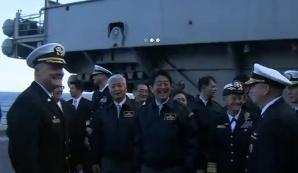 Các sĩ quan thuộc Lực lượng phòng vệ biển Nhật Bản chào đón các phóng viên đưa tin về cuộc tập trận Malabar ngày 15/5. Ảnh: Indiatimes