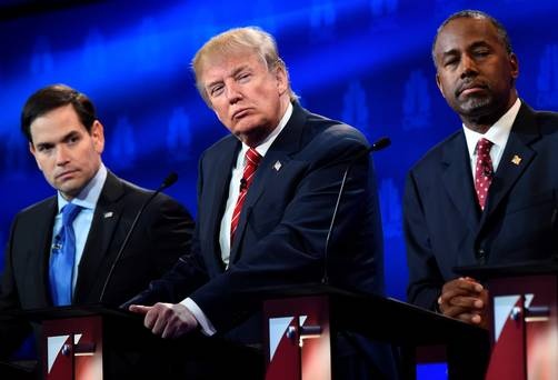 Republican Presidential hopefuls (L-R) Marco Rubio, Donald Trump, and Ben Carson look