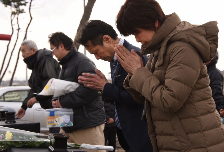 Nguoi Nhat danh 1 phut mac niem nan nhan dong dat, song than hinh anh