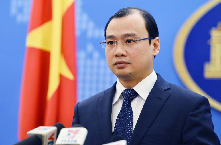 Dua thi the 8 nguoi Viet vu tai nan xe khach o Lao ve nuoc hinh anh