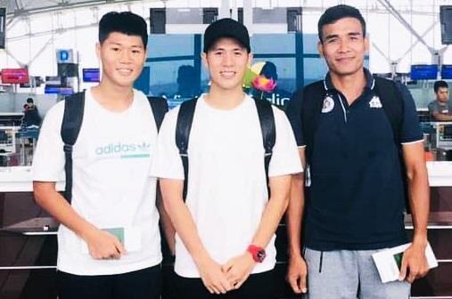 Dinh Trong cung em trai di Singapore phau thuat day chang cheo hinh anh