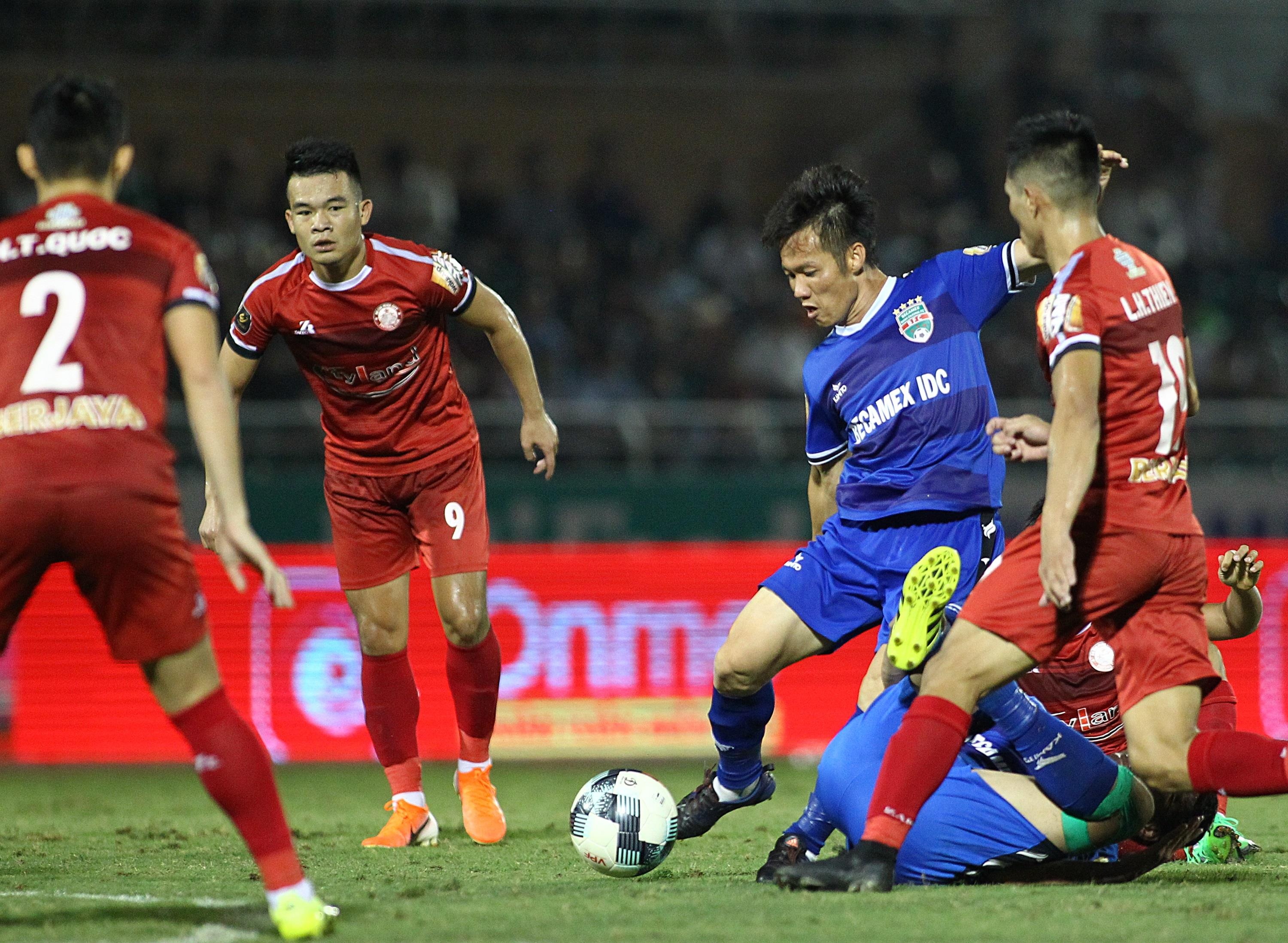 binh duong thua TP.HCM,  TP.HCM lay ngoi dau bang cua Ha Noi. anh 1