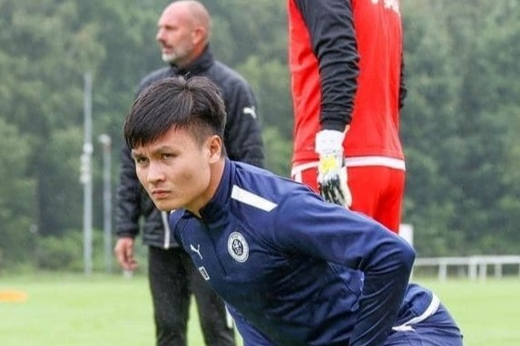 Quang Hai da tran dau tien cho Pau vao sang 9/7 hinh anh