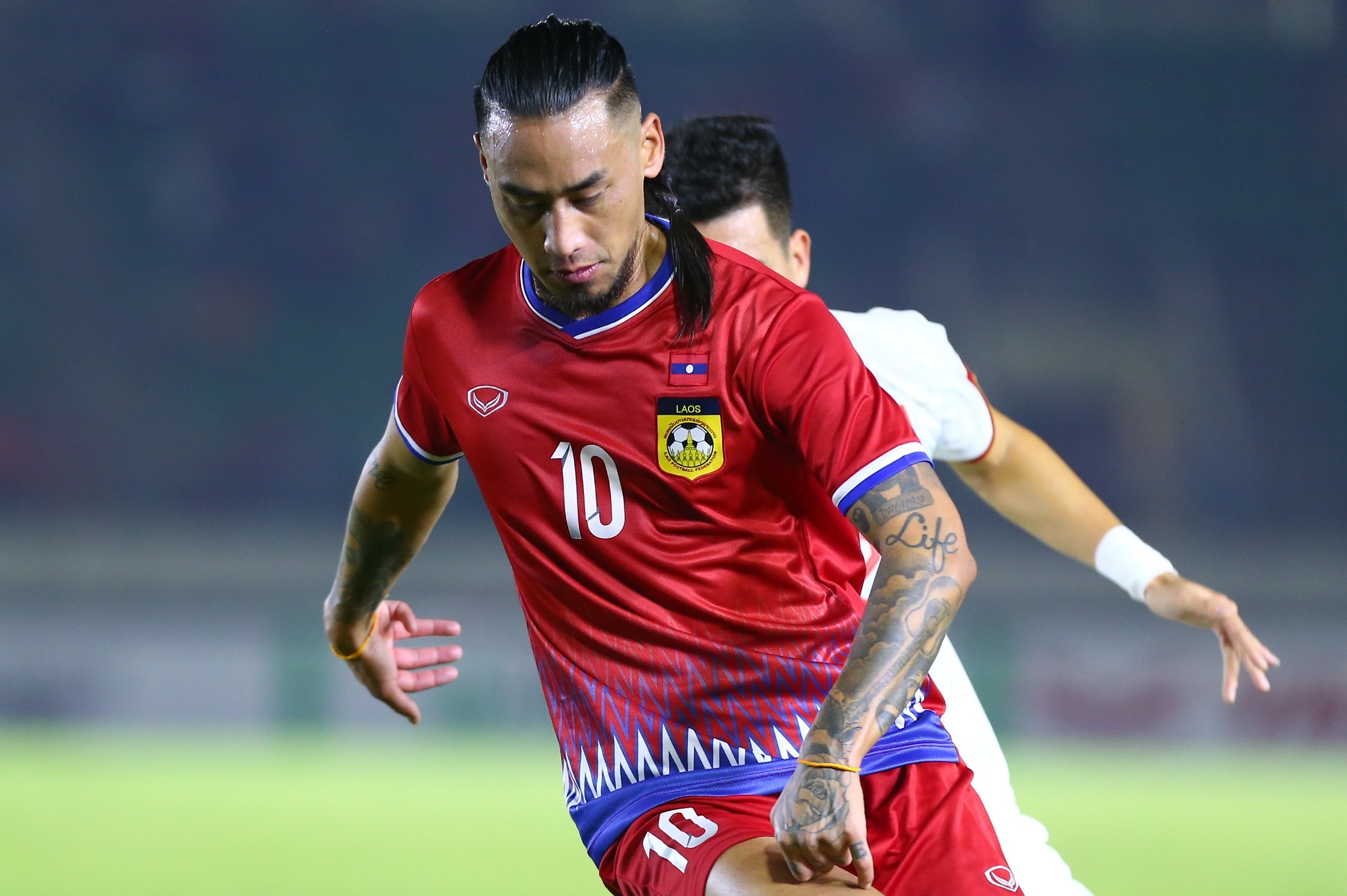 Ngoi sao goc Phap cua Lao chia tay AFF Cup hinh anh