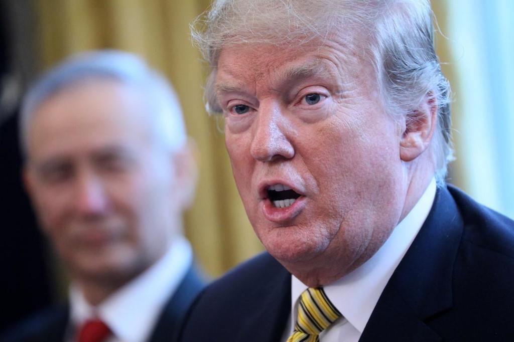 Ong Trump dung thue de chieu tuong, Trung Quoc khang cu bang ty gia hinh anh