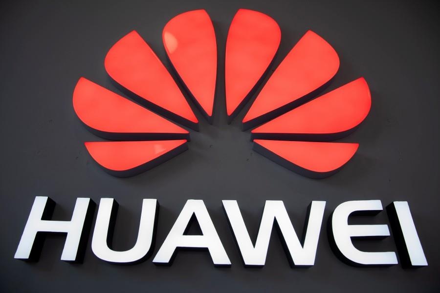 Huawei thue chuyen gia co quan he voi ong Trump de van dong hanh lang hinh anh