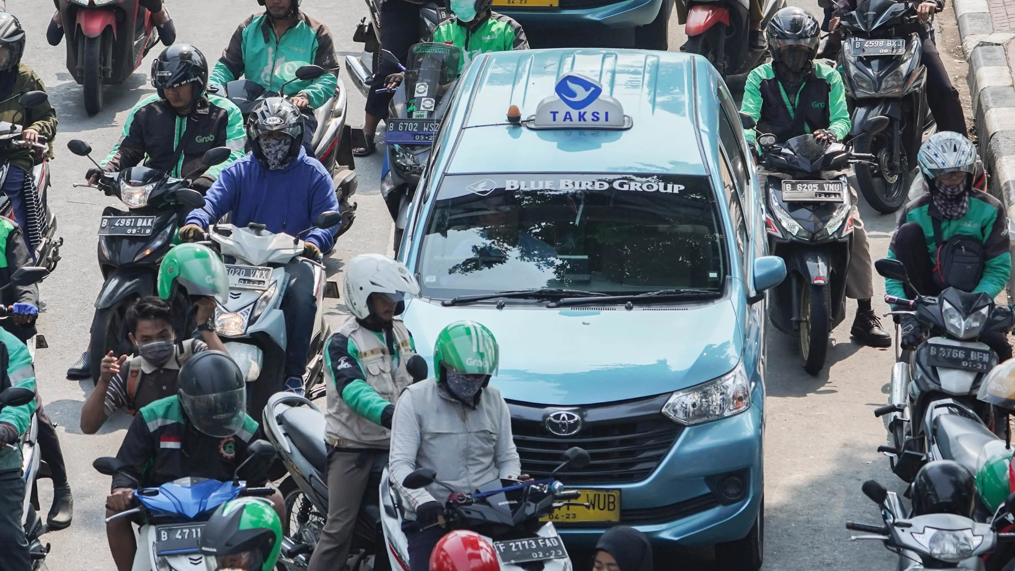 Grab va Go-Jek anh 1