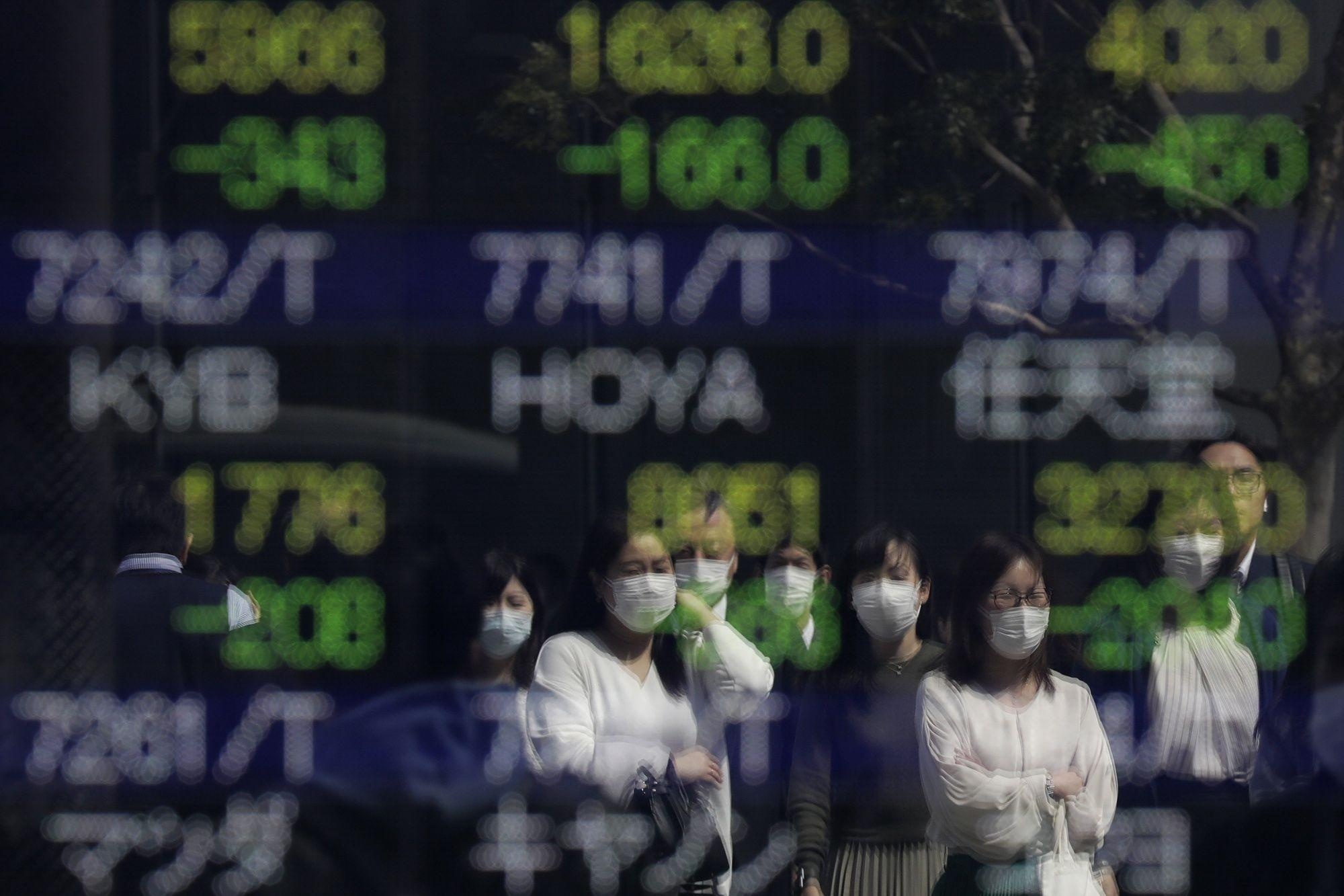 Kinh te toi te, chung khoan My van tang nho thuoc chong Covid-19 hinh anh