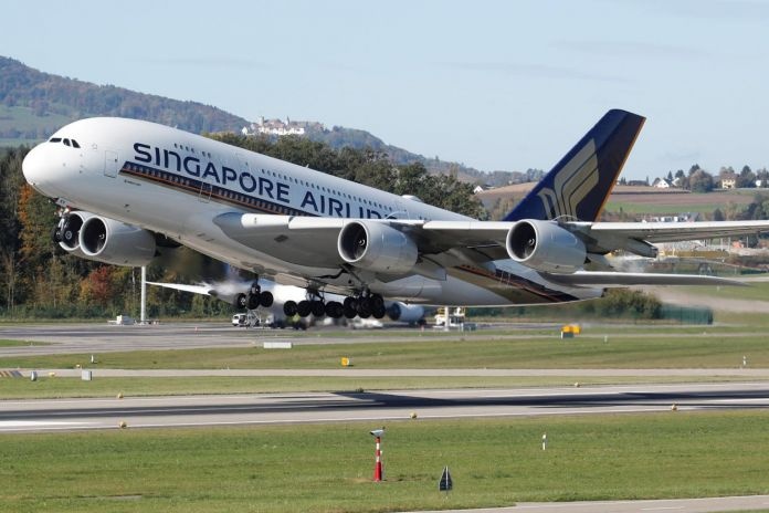 Singapore Airlines giam luong phi cong anh 1