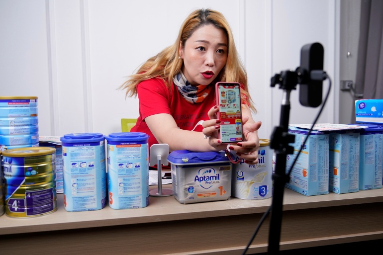 Cac cong ty khong lo Trung Quoc gianh giat thi truong mua hang nhom hinh anh