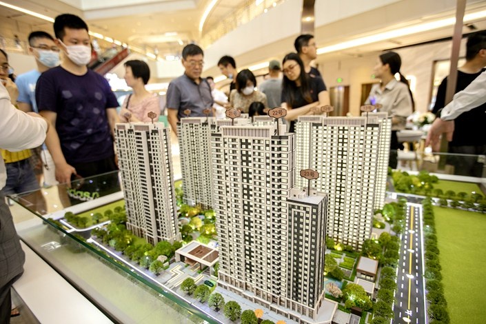 Cac dai gia bat dong san Trung Quoc doi mat nguy co vo no lon hinh anh