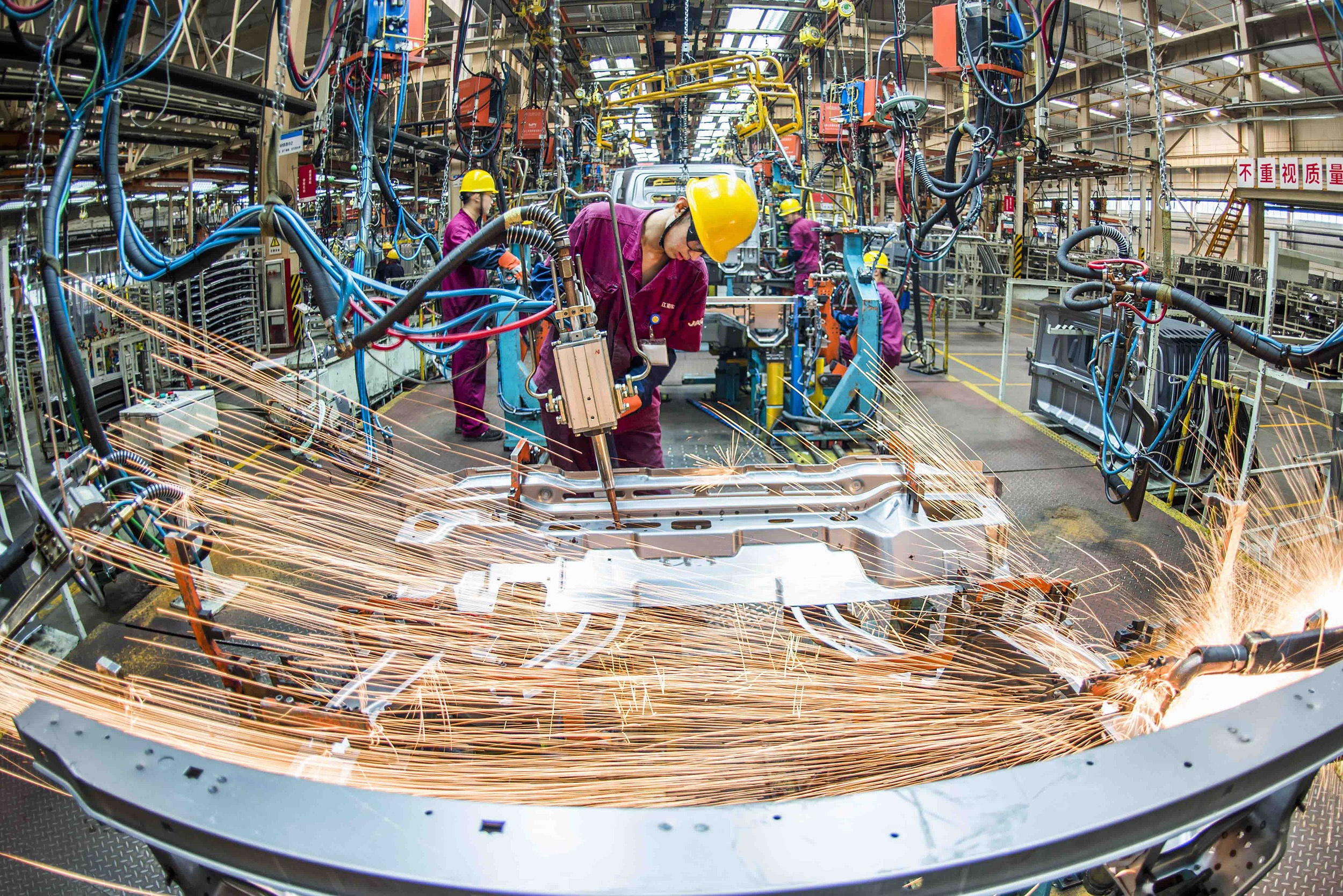 Kinh te Trung Quoc phuc hoi, nhung da tang cham lai hinh anh