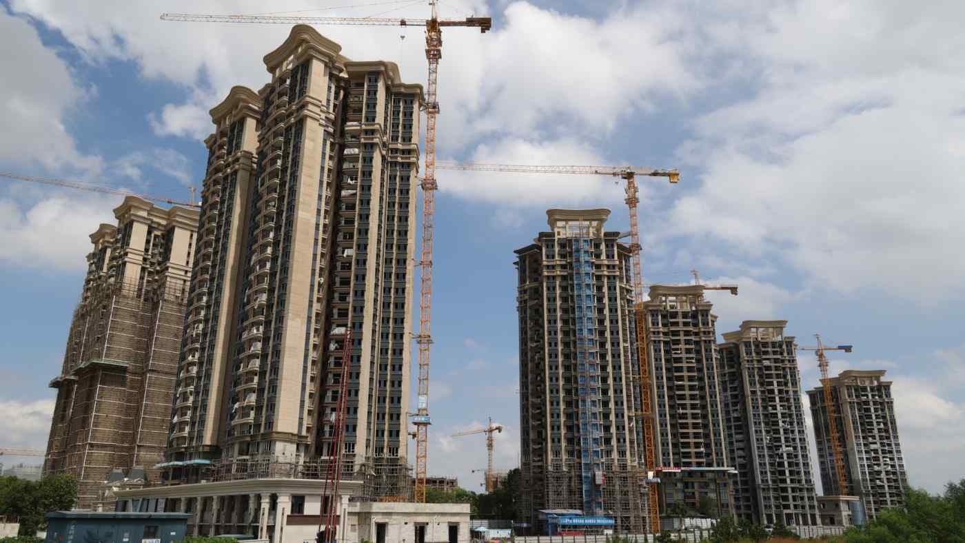 Cac tap doan dia oc Trung Quoc mat nguon tien khong lo hinh anh