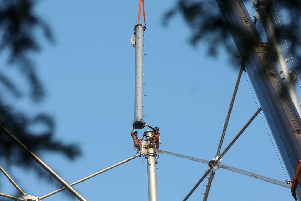 Khung hoang dien o Trung Quoc lan sang nen kinh te toan cau hinh anh