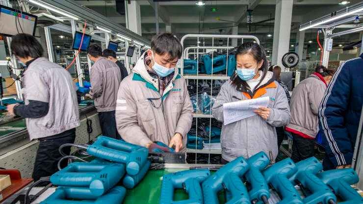 Cac nha may Trung Quoc chiu suc ep lon boi Omicron hinh anh