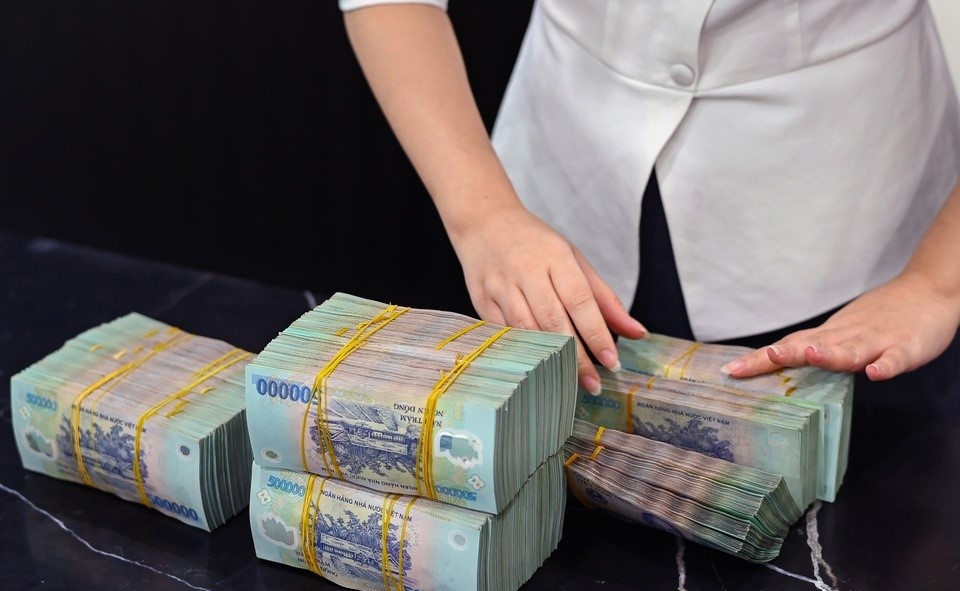 WB: 'Ap luc voi tien Dong da duoc noi bot' hinh anh