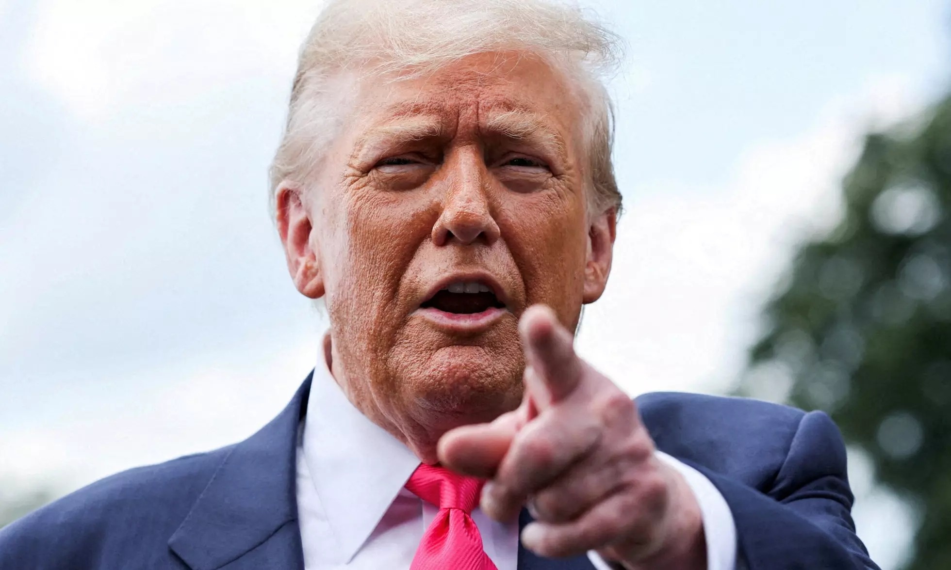 'Co tuc thue quan' cua ong Trump gap rao can hinh anh