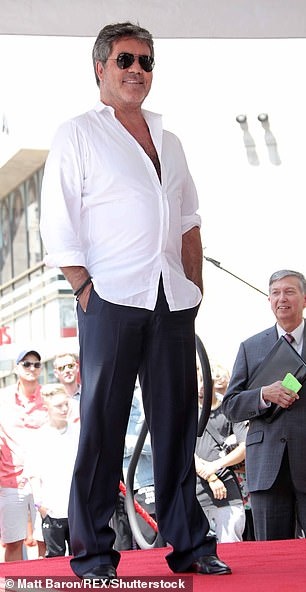 simon cowell giam can anh 1