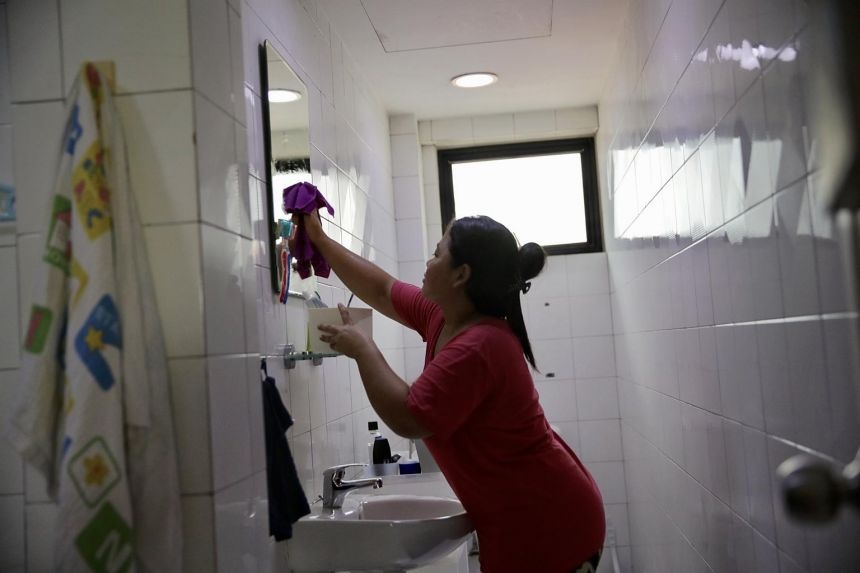 nguoi giup viec singapore doi luong 900 usd anh 2