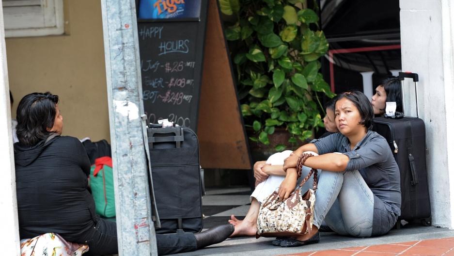 nguoi giup viec singapore doi luong 900 usd anh 1