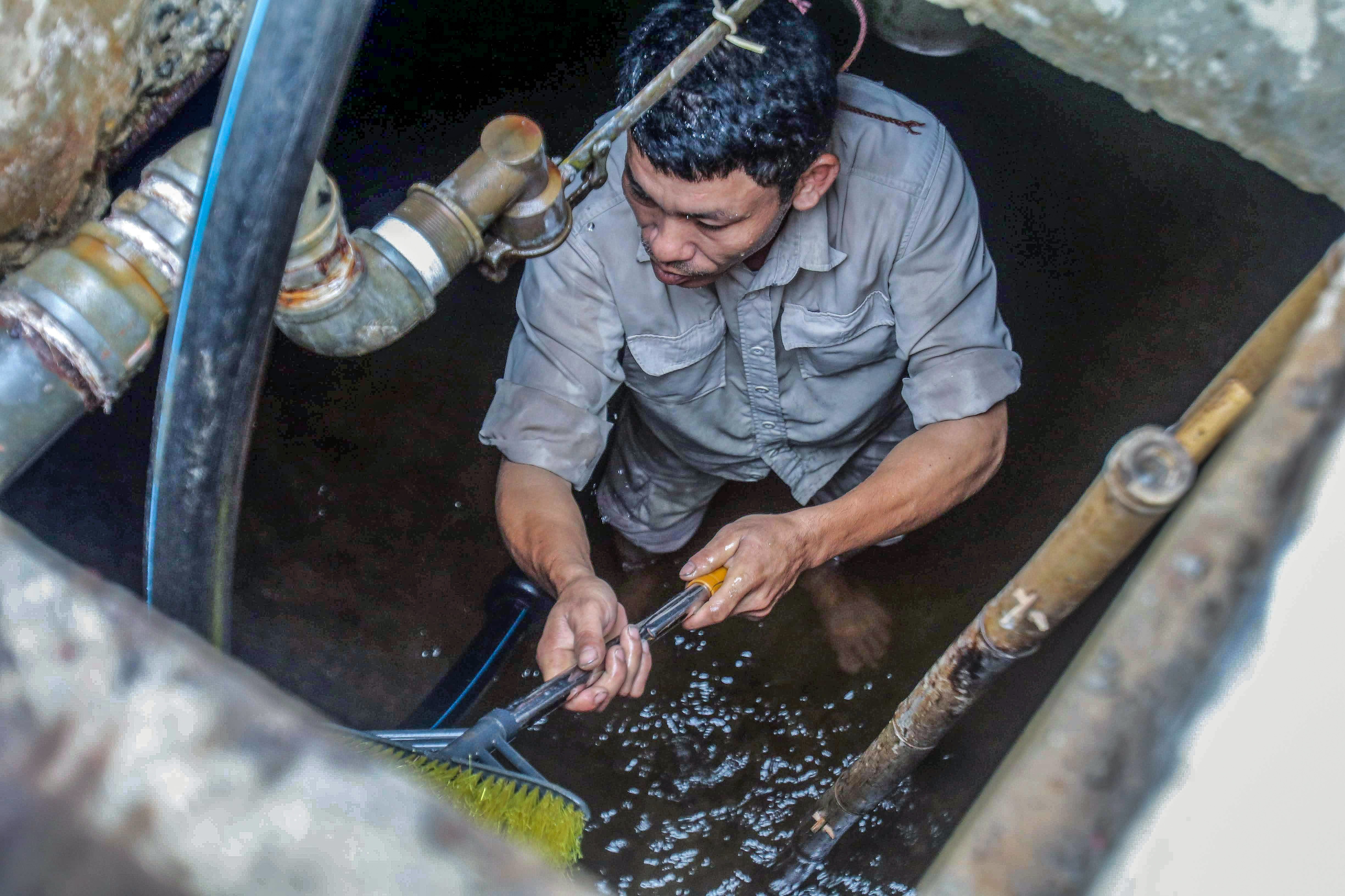 người dân Hà Nội xếp hàng lấy nước sạch ảnh 36 nguoi dan Ha Noi xep hang lay nuoc sach anh 36