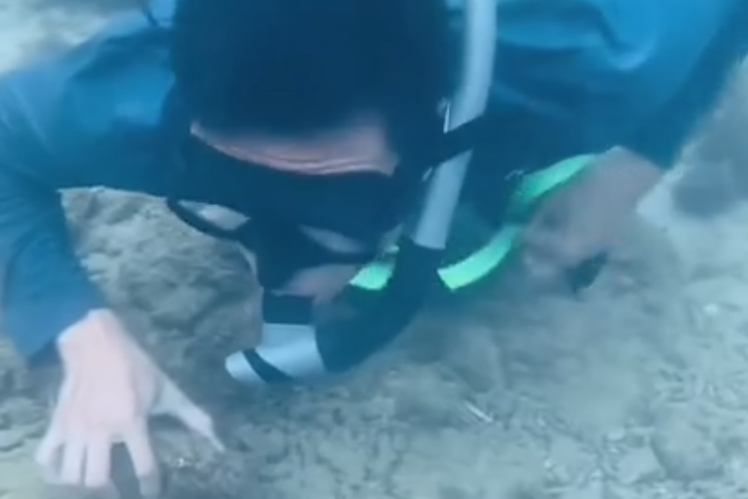 Nhac nho TikToker lan ngam san ho o Nha Trang hinh anh