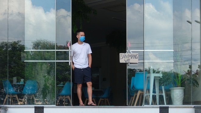 Doanh nghiep Ha Noi duoi suc, mong som duoc mo cua tro lai hinh anh