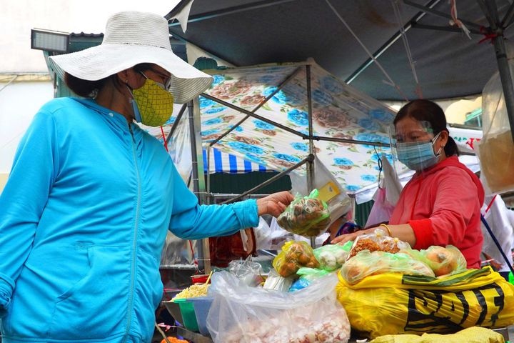 tong dai ho tro nguoi dan kho mua thuc pham anh 1