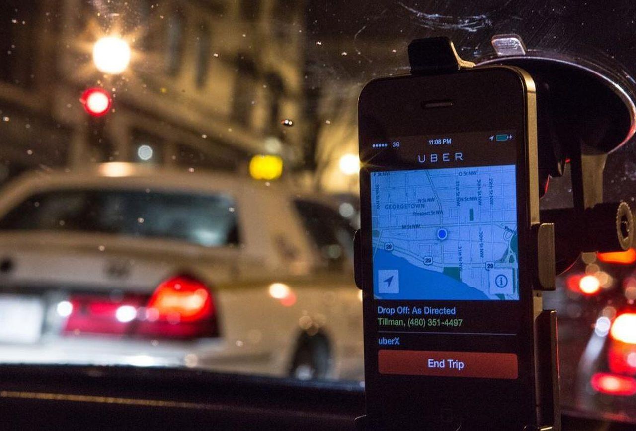 Tai xe Uber phat hoang vi vo tinh cho cuop hinh anh