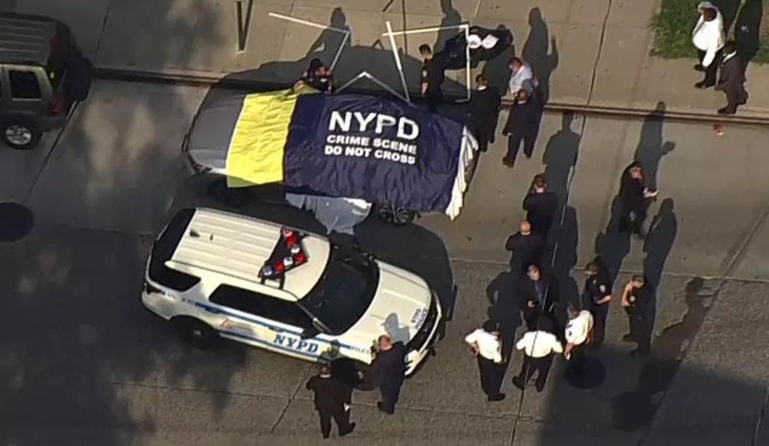 Ong bo My bi bat vi de hai con tu vong tren oto giua trua nang hinh anh