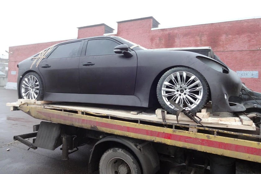 Tesla Model S bi sao chep tai Nga anh 2