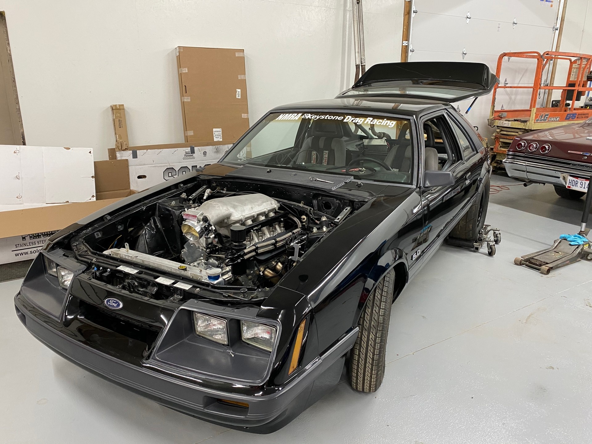 nguoi dan ong My dang ky bien so xe covid-19 anh 2