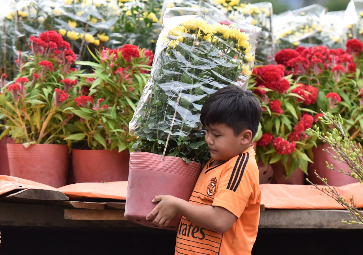 Canh tap nap ngay giap Tet o ben Binh Dong hinh anh